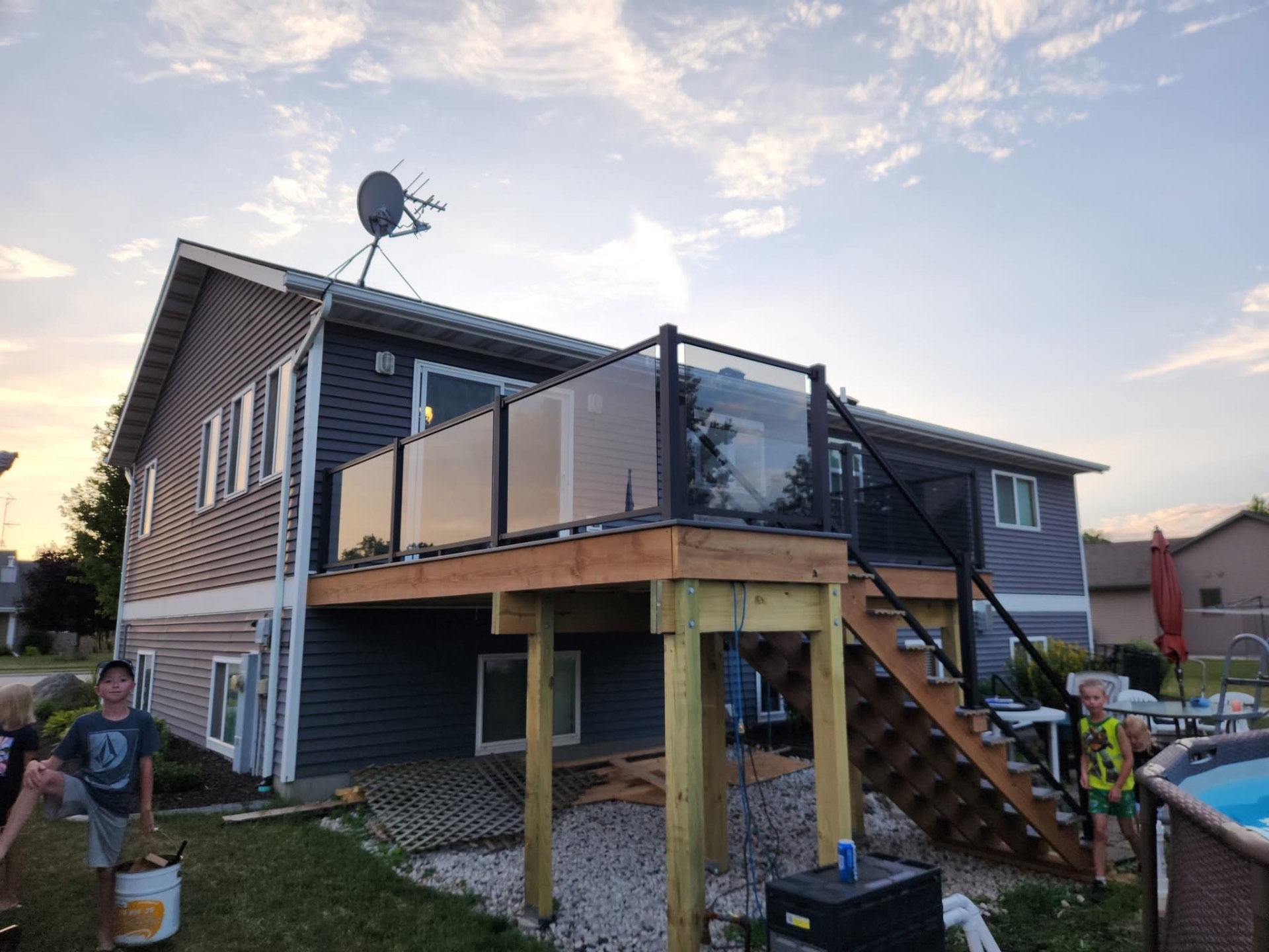 Custom elevated deck with glass railing